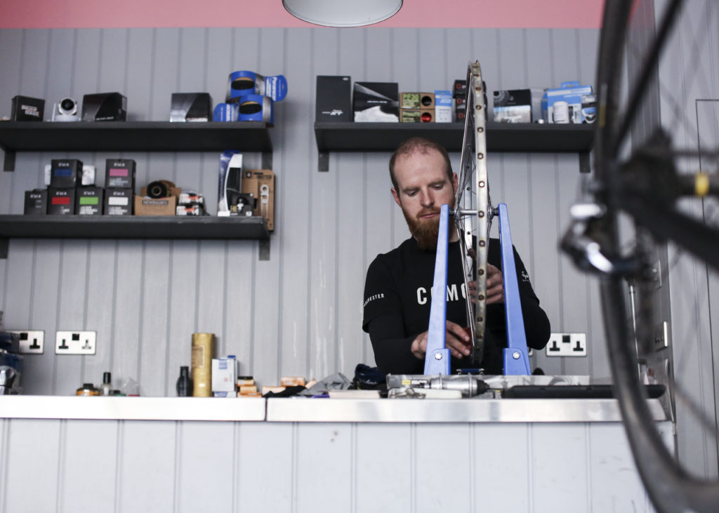 One of our mechanics working in the Rapha Manchester Workshop.